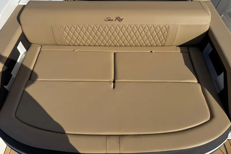  Yacht Photos Pics Luxurious tan seating on 2026 Sea Ray SLX 310 boat, featuring diamond stitching.