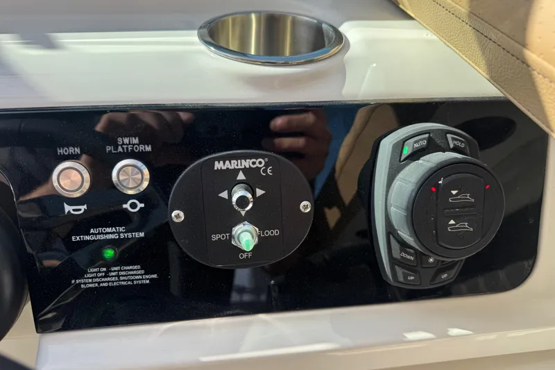  Yacht Photos Pics Control panel of 2026 Sea Ray SLX 310 boat with various switches and dials.