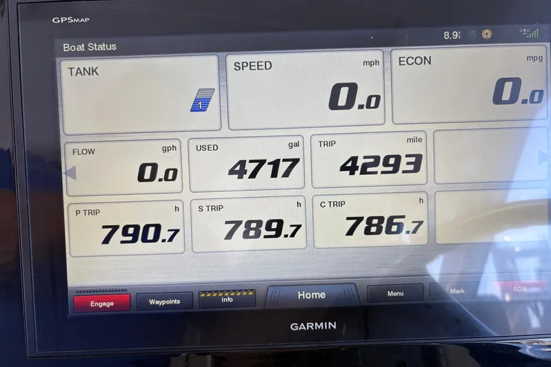 Famille Yacht Photos Pics Garmin GPS display on 2020 Pursuit DC 365 Dual Console showing boat status and trip data.
