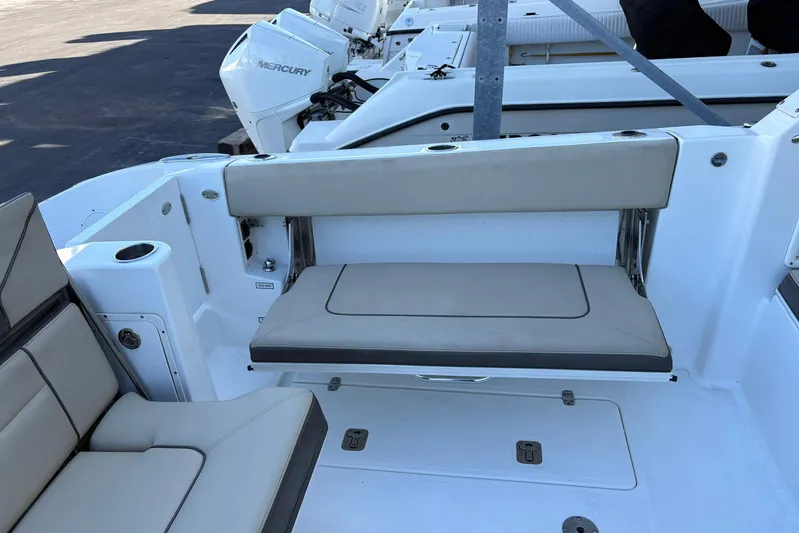 Famille Yacht Photos Pics 2020 Pursuit DC 365 Dual Console boat interior with seating and Mercury engines.