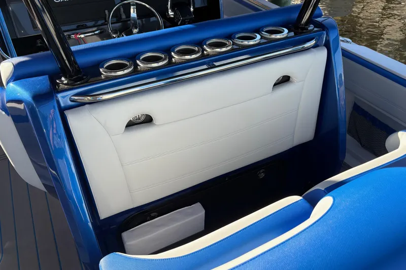  Yacht Photos Pics 2023 Nor-Tech 390 Sport Center Console with blue and white seating and cup holders.