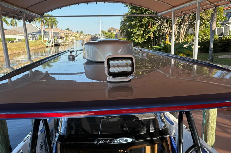 Yacht Photos Pics 2023 Nor-Tech 390 Sport Center Console boat with sleek roof and LED light.