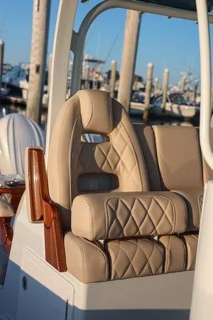  Yacht Photos Pics Luxurious seating on a 2026 Freeman 38 boat, featuring diamond-stitched upholstery.