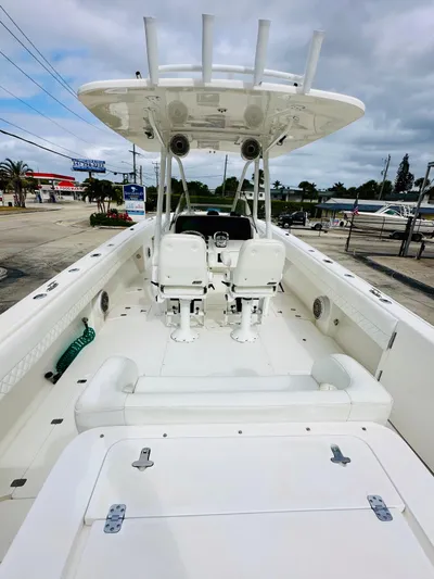  Yacht Photos Pics 2004 Intrepid 370 Open boat with dual seats and spacious deck.