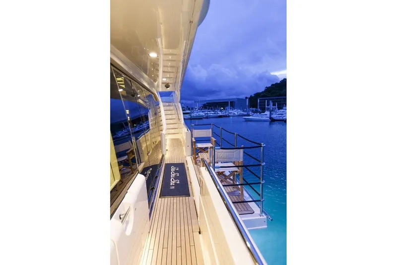 Sha Sha Sha IV Yacht Photos Pics Luxurious 2014 Custom Line 100 yacht docked at marina during twilight.