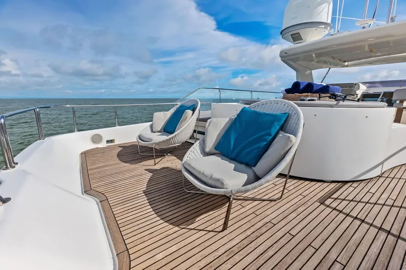 Sha Sha Sha IV Yacht Photos Pics Luxurious 2014 Custom Line 100 yacht deck with stylish seating and ocean view.