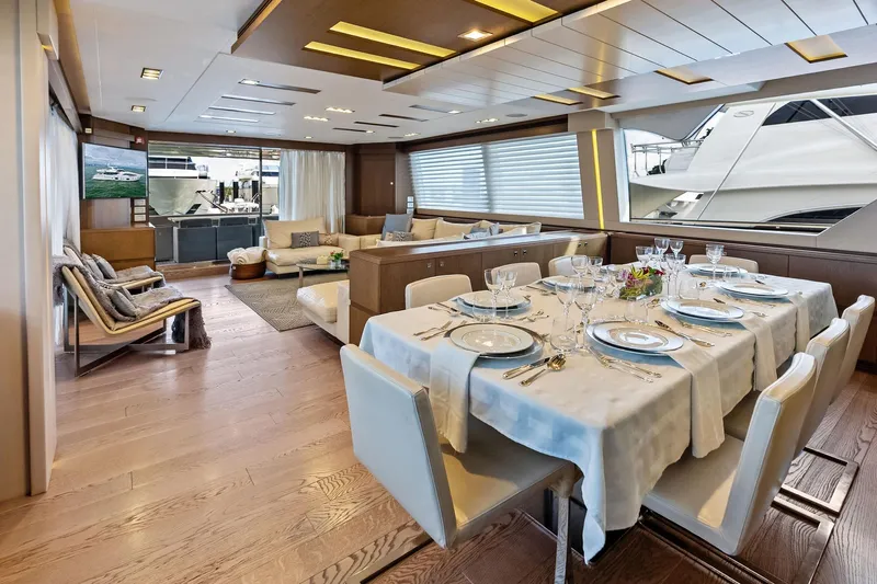 Sha Sha Sha IV Yacht Photos Pics Luxurious yacht interior with elegant dining area, Custom Line 100, 2014 model.