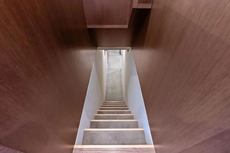 Sha Sha Sha IV Yacht Photos Pics Narrow wooden staircase with modern design, Custom Line 100, 2014 model.