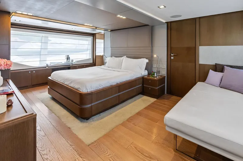 Sha Sha Sha IV Yacht Photos Pics Luxurious 2014 Custom Line 100 yacht bedroom with modern design and elegant furnishings.
