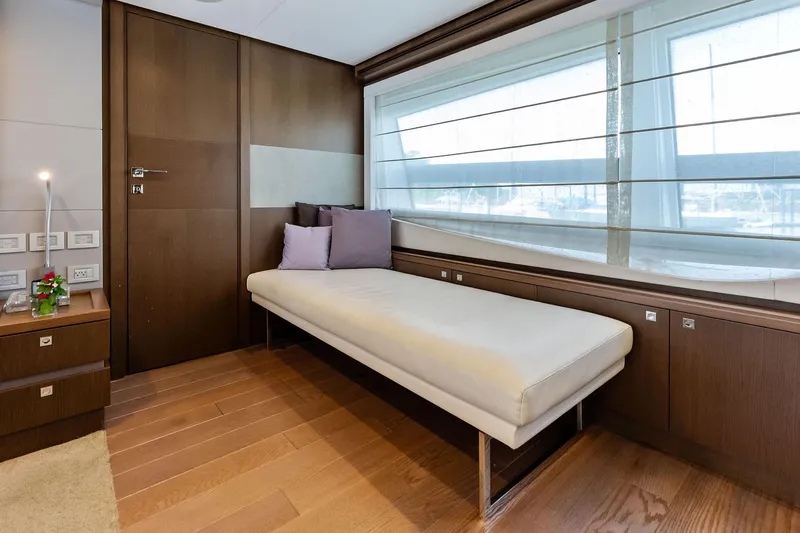 Sha Sha Sha IV Yacht Photos Pics Luxurious 2014 Custom Line 100 yacht interior with sleek wood finishes and modern decor.