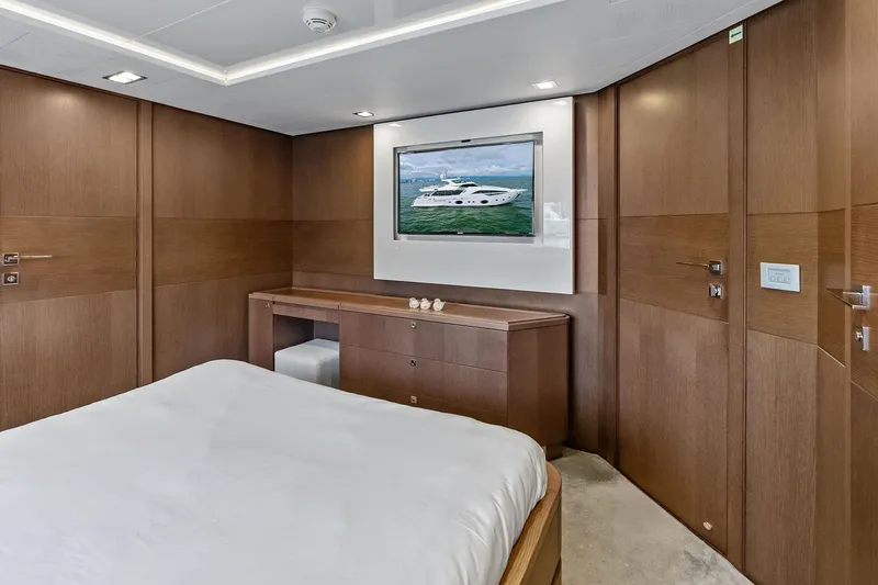 Sha Sha Sha IV Yacht Photos Pics Luxurious yacht bedroom with wooden paneling, Custom Line 100 model, 2014.