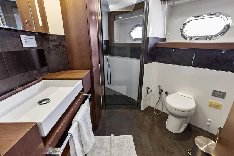 Sha Sha Sha IV Yacht Photos Pics Luxurious yacht bathroom with modern fixtures, Custom Line 100, 2014 model.