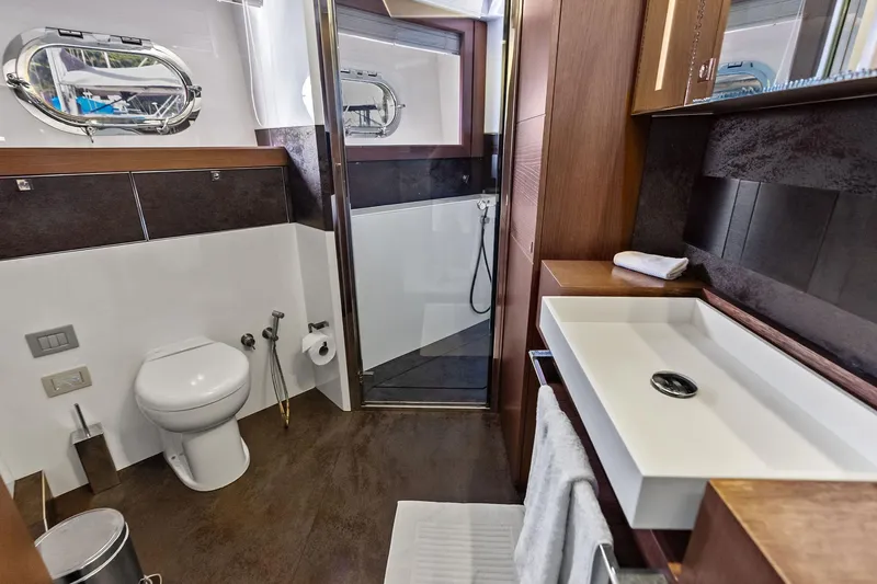 Sha Sha Sha IV Yacht Photos Pics Luxurious yacht bathroom with modern fixtures, Custom Line 100, 2014 model.