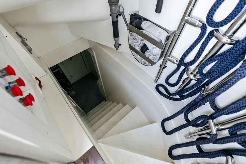 Sha Sha Sha IV Yacht Photos Pics Staircase on Custom Line 100 yacht, featuring ropes and control panel, 2014 model.