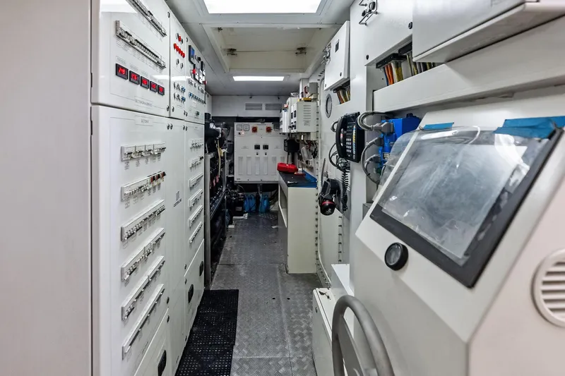 Sha Sha Sha IV Yacht Photos Pics Electrical control room with panels and equipment, Custom Line 100 yacht, 2014 model.