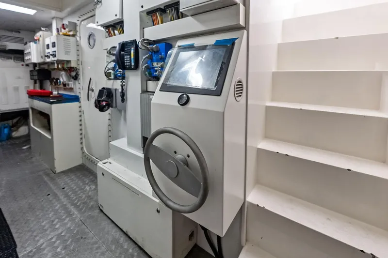 Sha Sha Sha IV Yacht Photos Pics Control room interior with equipment and stairs, Custom Line 100 yacht, 2014 model.