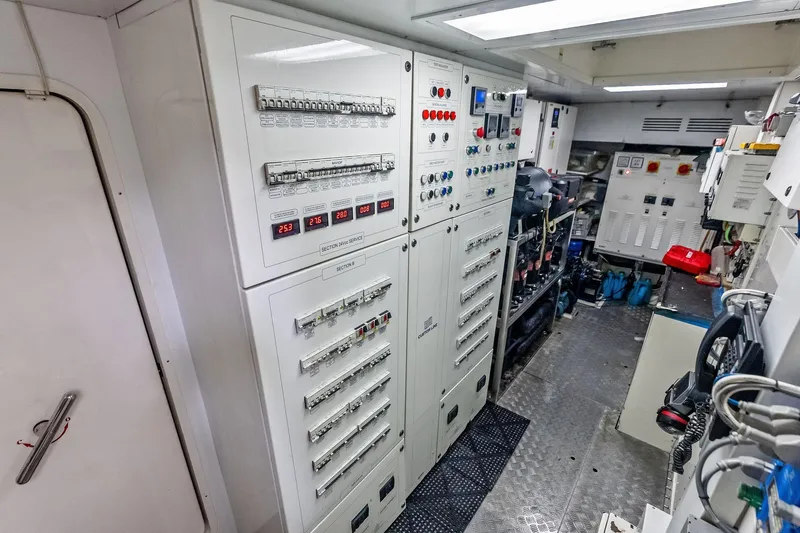 Sha Sha Sha IV Yacht Photos Pics Electrical control room with panels and equipment, Custom Line 100 yacht, 2014 model.