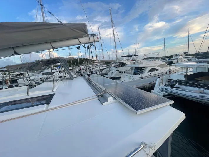 Carpe Aura Yacht Photos Pics Fountaine Pajot Helia 44 catamaran docked in a marina, 2018 model.
