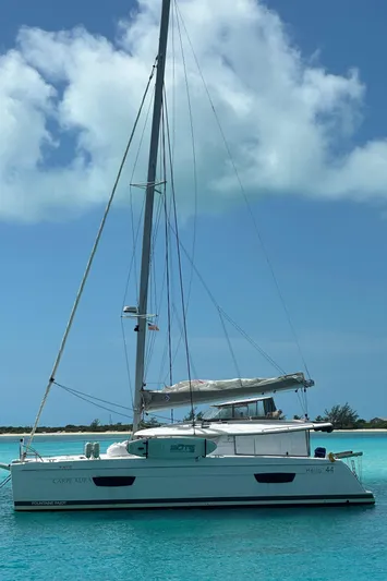 Carpe Aura Yacht Photos Pics 2018 Fountaine Pajot Helia 44 catamaran sailing on turquoise waters.