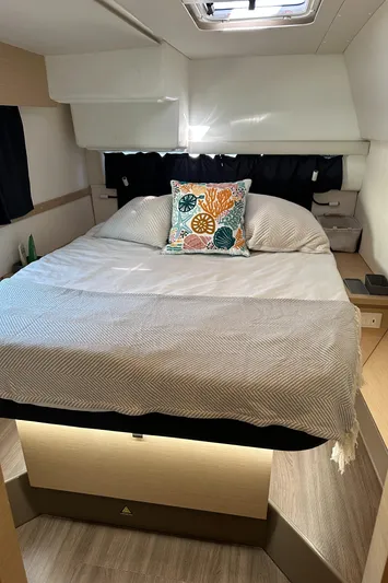 Carpe Aura Yacht Photos Pics Cozy bedroom in 2018 Fountaine Pajot Helia 44 catamaran with modern decor and natural light.