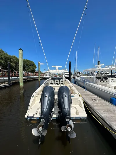  Yacht Photos Pics 2022 Cobia 350 Center Console boat docked with dual outboard engines.