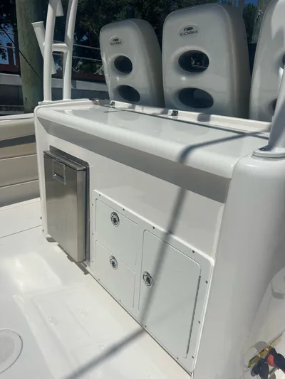  Yacht Photos Pics 2022 Cobia 350 Center Console boat interior with storage compartments and seating.