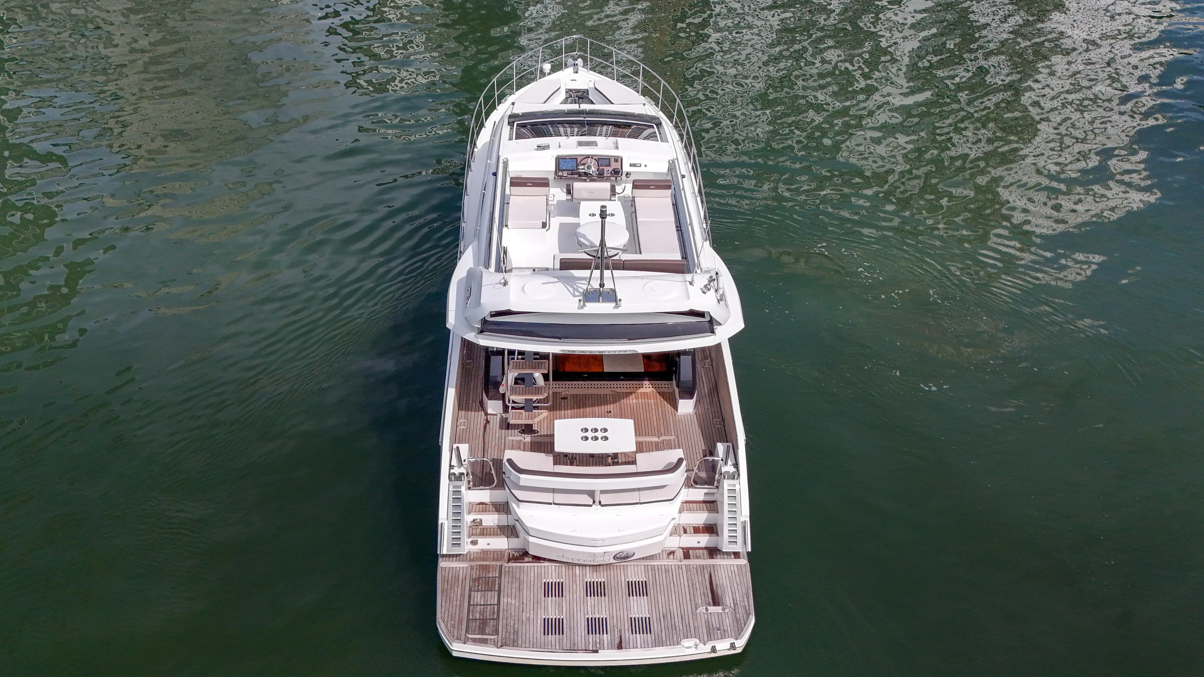  Yacht Photos Pics Aerial view of 2020 Galeon 510 Sky yacht on calm water.