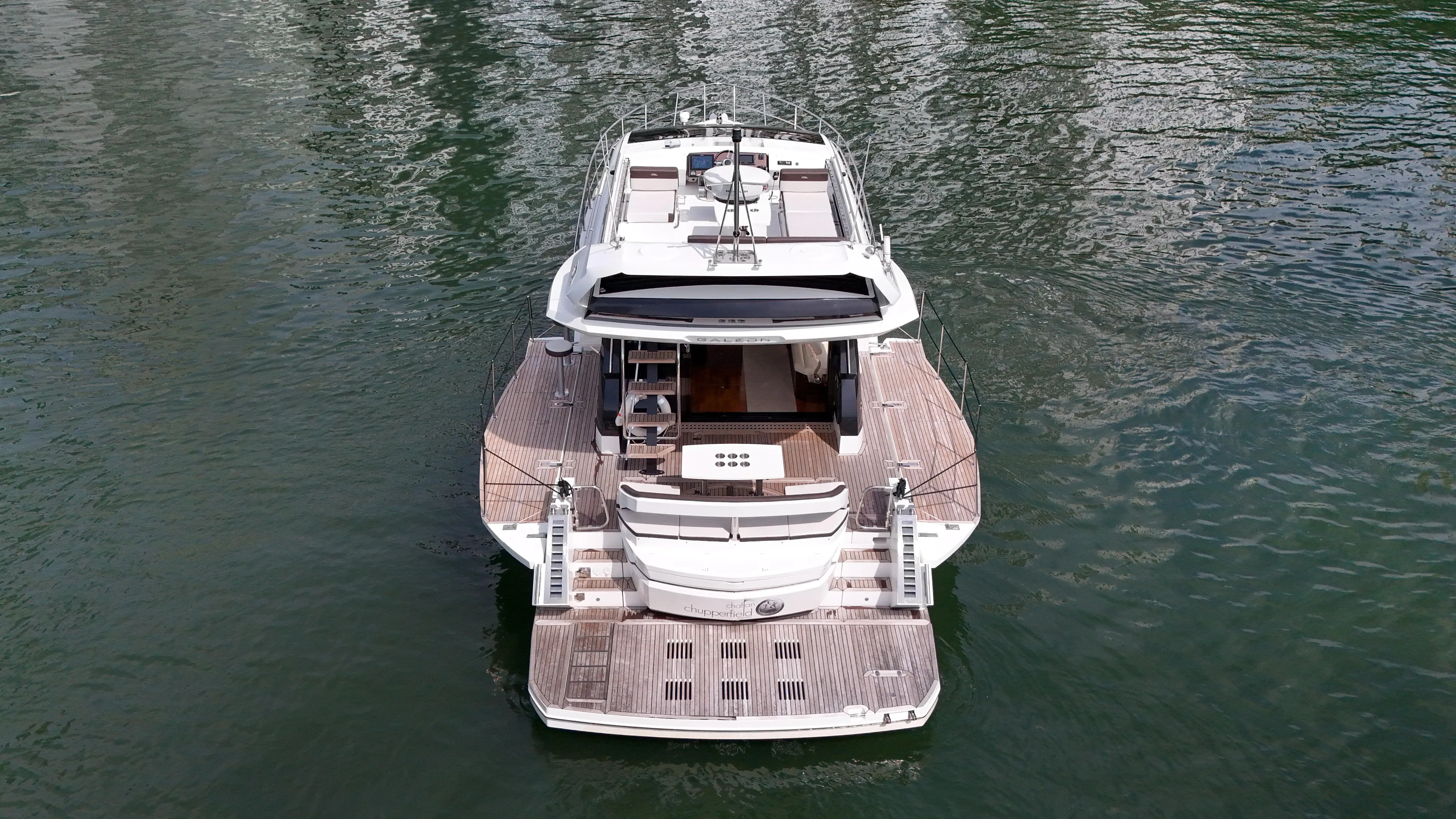  Yacht Photos Pics Galeon 510 Sky 2020 yacht on calm water, rear view.