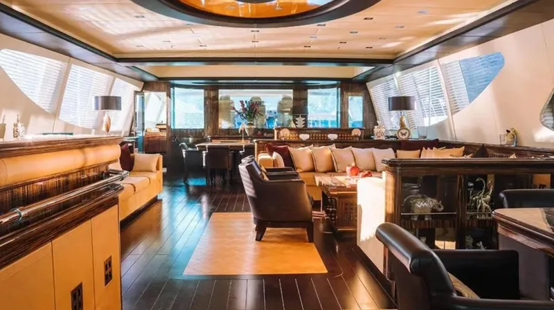  Yacht Photos Pics Luxurious interior of a 2009 Mangusta 165 yacht with elegant furnishings and ambient lighting.