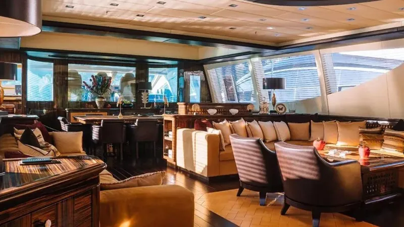  Yacht Photos Pics Luxurious interior of 2009 Mangusta 165 yacht with elegant seating and modern decor.