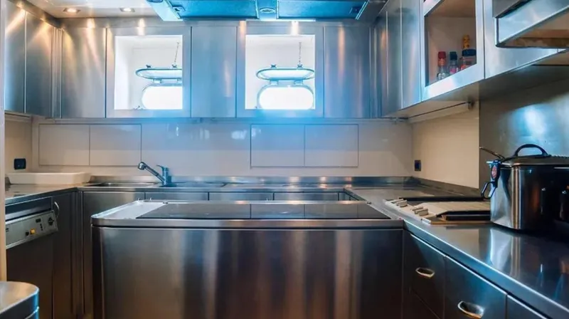  Yacht Photos Pics Luxurious stainless steel kitchen interior on a 2009 Mangusta 165 yacht.