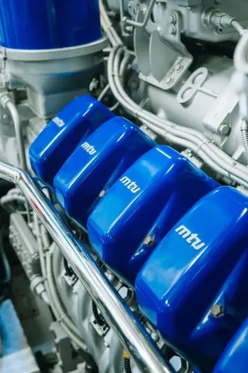  Yacht Photos Pics Engine components of a 2009 Mangusta 165 yacht, featuring blue MTU covers.