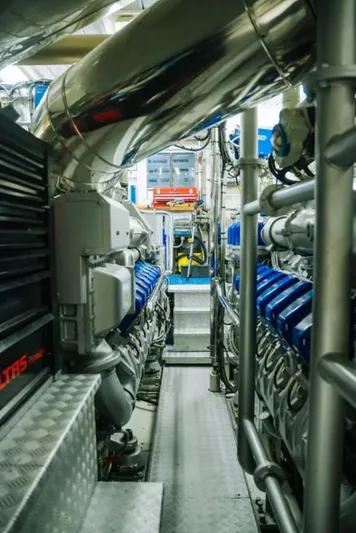  Yacht Photos Pics Engine room of 2009 Mangusta 165 yacht, showcasing machinery and equipment.