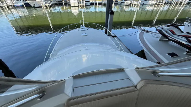 Steel Mahlin Yacht Photos Pics 2006 Ocean Yachts 57 Super Sport docked at marina, view from deck.