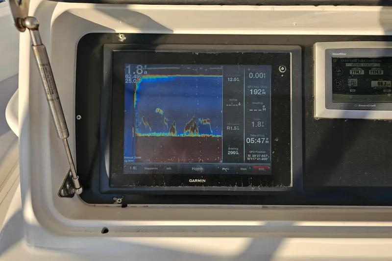 Team Turbo Yacht Photos Pics Garmin marine display on 2013 Viking 42 Convertible boat dashboard.