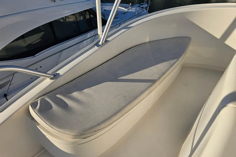 Team Turbo Yacht Photos Pics Cushioned seating area on 2013 Viking 42 Convertible yacht deck.