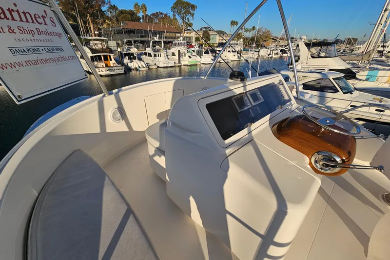 Team Turbo Yacht Photos Pics 2013 Viking 42 Convertible yacht helm at marina, sunny day, Dana Point, California.