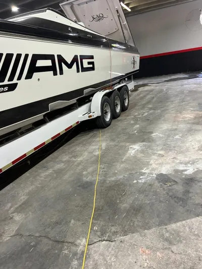  Yacht Photos Pics 2012 Cigarette 50' Marauder AMG boat on trailer in garage.