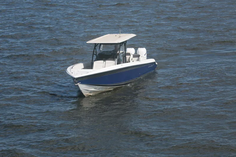  Yacht Photos Pics 2018 Nor-Tech 340 Sport Center Console boat on open water.