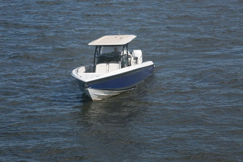  Yacht Photos Pics 2018 Nor-Tech 340 Sport Center Console boat on open water.