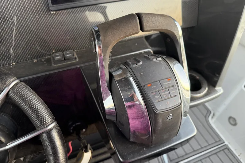  Yacht Photos Pics Throttle control of 2018 Nor-Tech 340 Sport Center Console boat, featuring modern design.