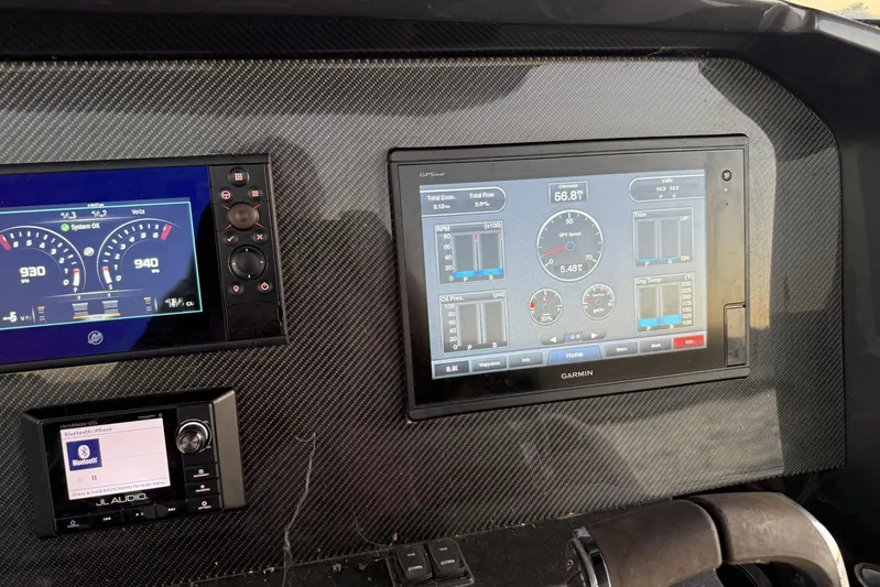  Yacht Photos Pics Dashboard of a 2018 Nor-Tech 340 Sport Center Console with Garmin navigation display.