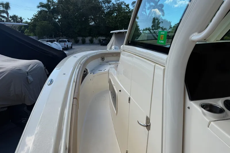  Yacht Photos Pics 2022 Scout 355 LXF boat deck with sleek design and modern features.