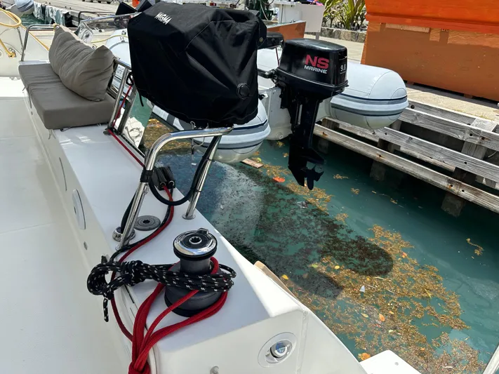 Goin' Coastal Yacht Photos Pics 2018 Fountaine Pajot Helia 44 Evolution yacht deck with winch and outboard motor.