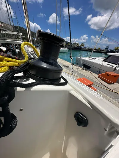 Goin' Coastal Yacht Photos Pics 2018 Fountaine Pajot Helia 44 Evolution sailboat winch with ropes, docked in a marina.