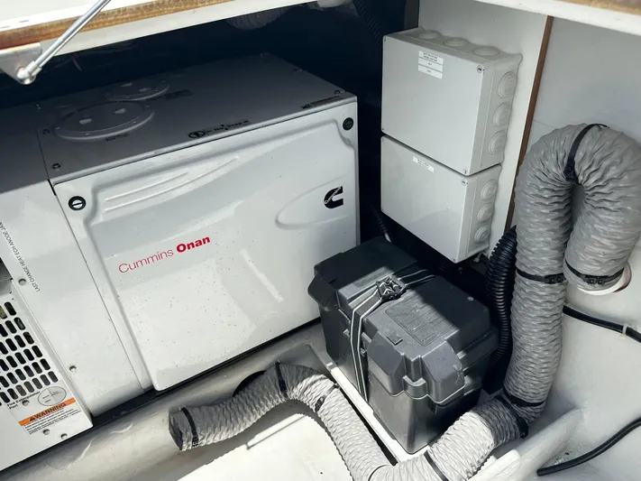 Goin' Coastal Yacht Photos Pics Cummins Onan generator in 2018 Fountaine Pajot Helia 44 Evolution yacht engine room.