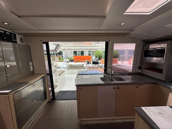 Goin' Coastal Yacht Photos Pics Modern kitchen interior of 2018 Fountaine Pajot Helia 44 Evolution catamaran.