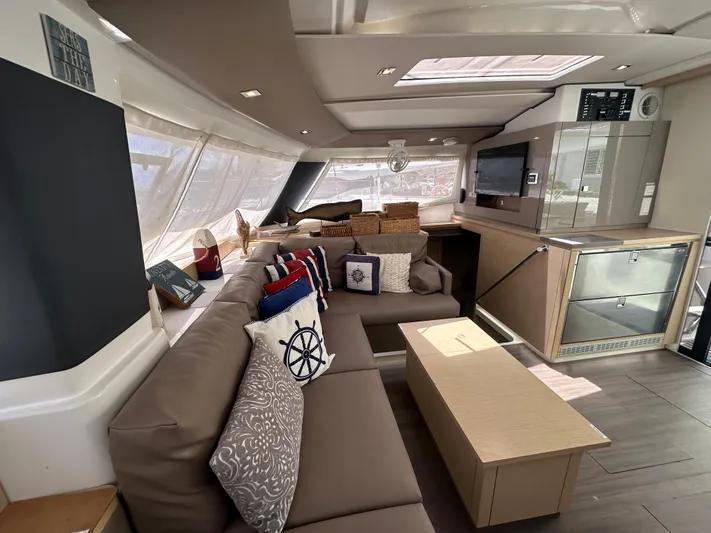 Goin' Coastal Yacht Photos Pics Luxurious interior of 2018 Fountaine Pajot Helia 44 Evolution catamaran with modern furnishings.