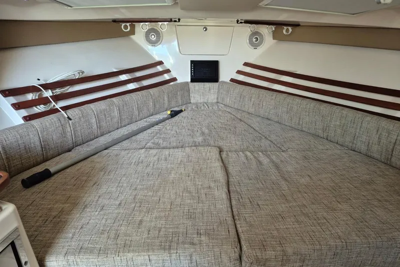 Rising Sun Yacht Photos Pics 2018 Grady-White Express 330 cabin interior with spacious cushioned seating.