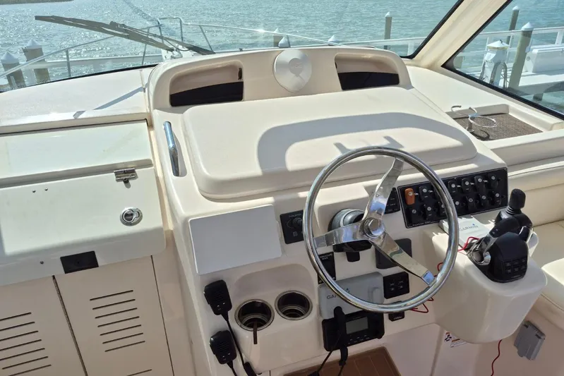 Rising Sun Yacht Photos Pics 2018 Grady-White Express 330 helm with steering wheel and control panel.